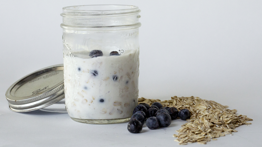 Jar of creamy blueberry overnight oatmeal
