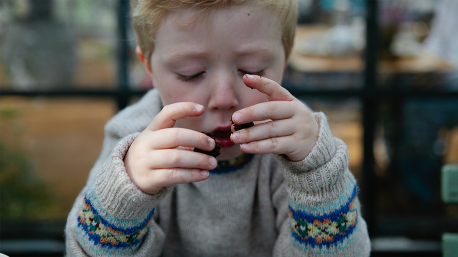 Child holding legos