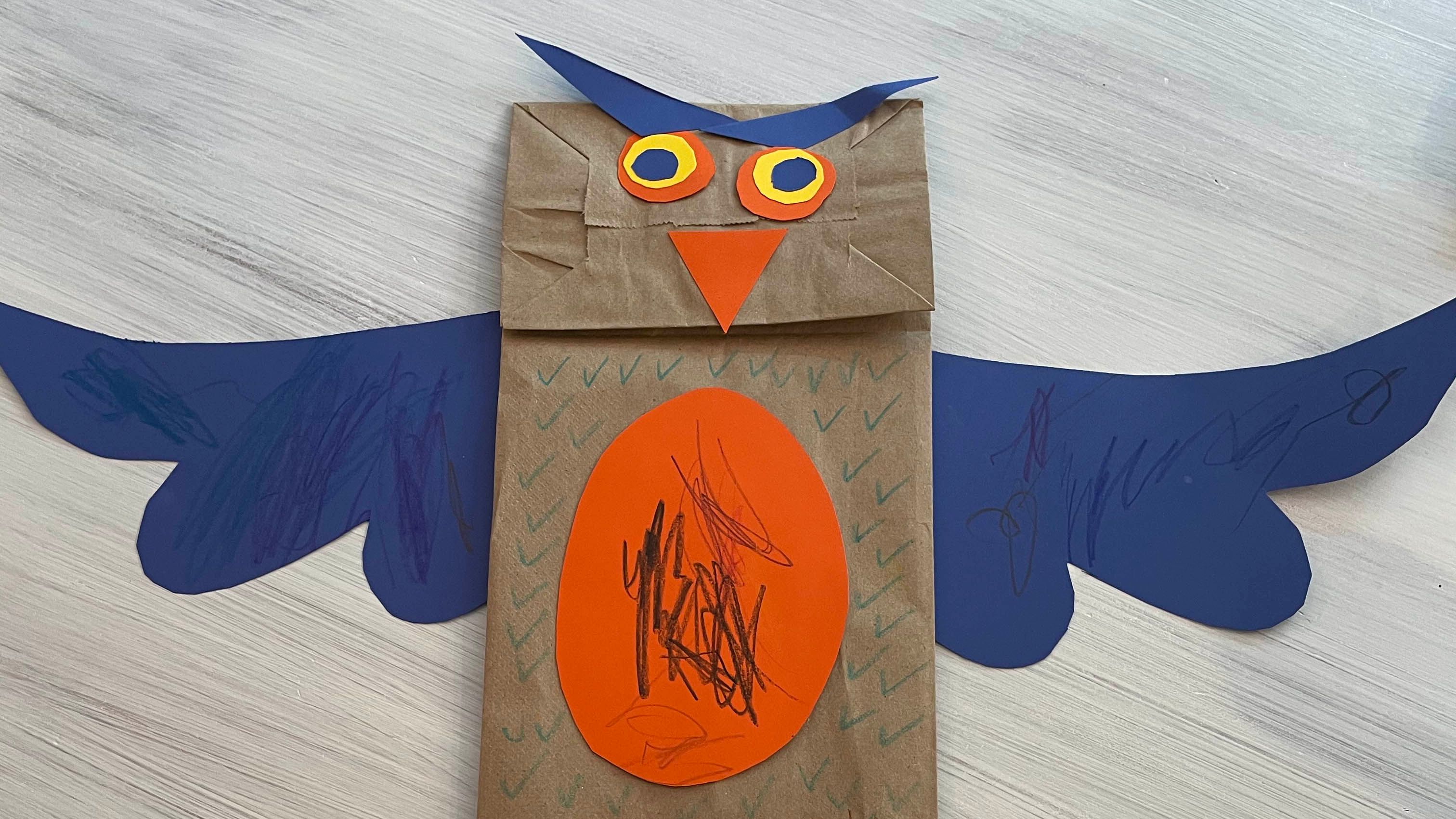Owl made out of paper bag and other colorful cutouts