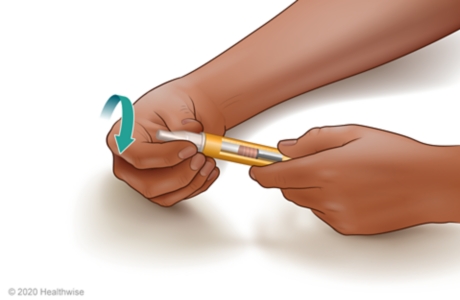 Putting a new needle in an insulin pen Putting a new needle in an insulin pen