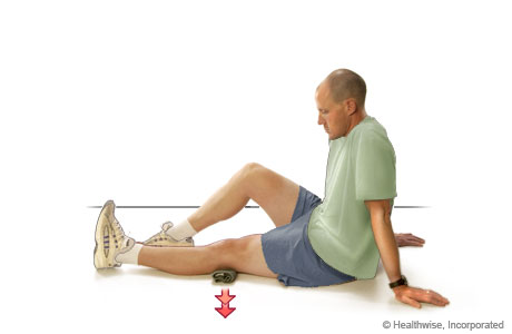 A man doing a quad exercise A man doing a quad exercise