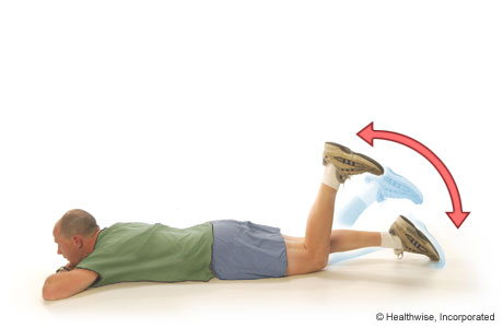 A man doing the active-knee-flexion exercise A man doing the active-knee-flexion exercise