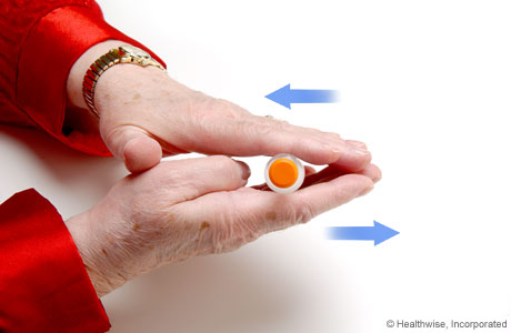 Rolling an insulin vial between the hands Rolling an insulin vial between the hands