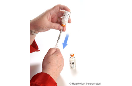 Drawing cloudy insulin into the syringe Drawing cloudy insulin into the syringe