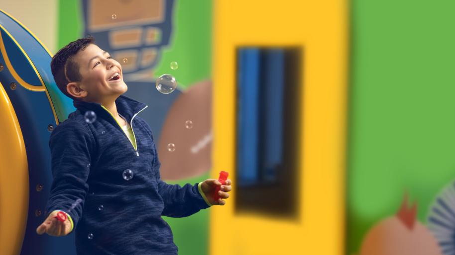 Dominic looking at bubbles