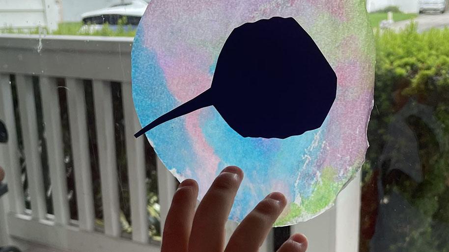Coffee filter suncatcher with an ocean animal in the center
