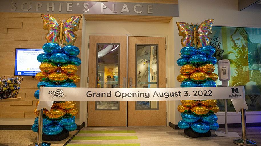 Enterance to Sophie's Place with balloons on either side of the door
