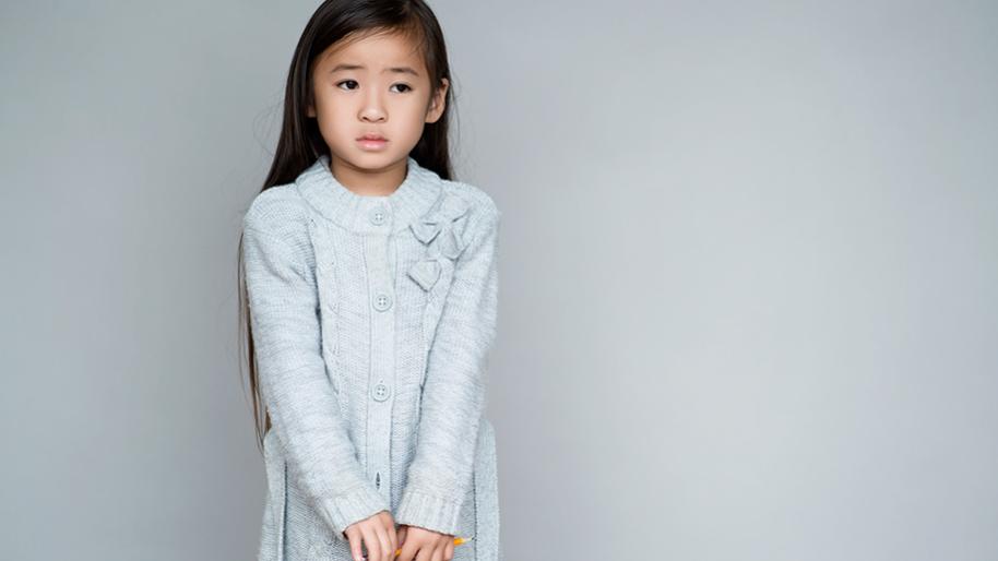 Little girl looking anxious