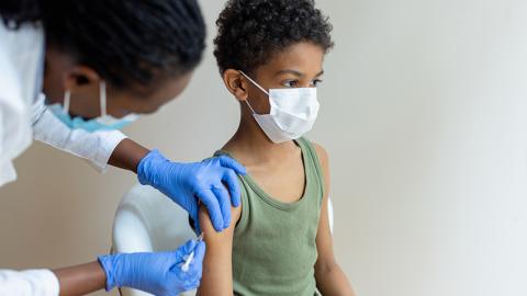 Little boy receiving the vaccine