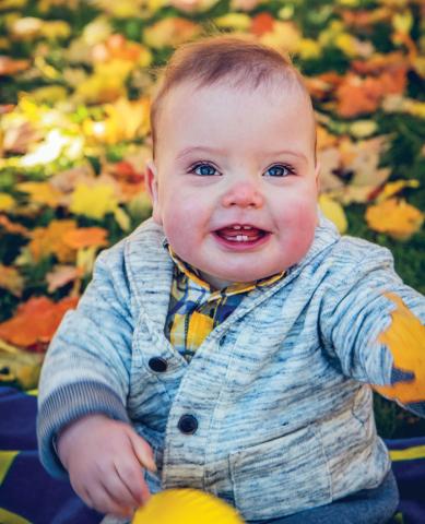 Carter Hilton in the autumn leaves