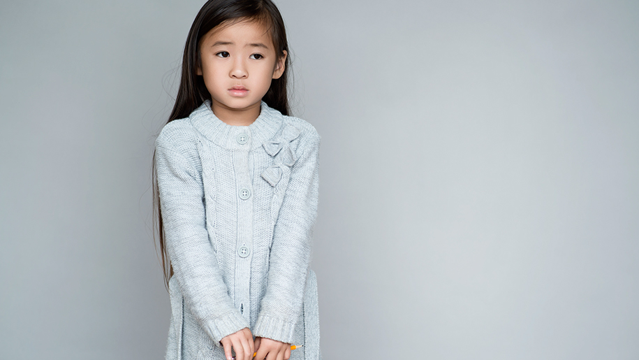 Little girl looking anxious